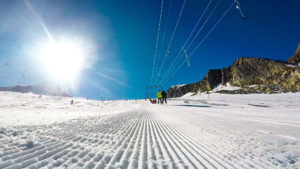 Ski slope with skiers | Glenwood Medical Associates